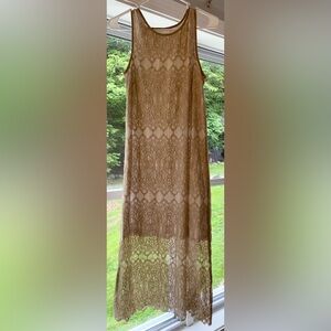 Kenzie size Medium white dress with knee length tan lace overlay.
